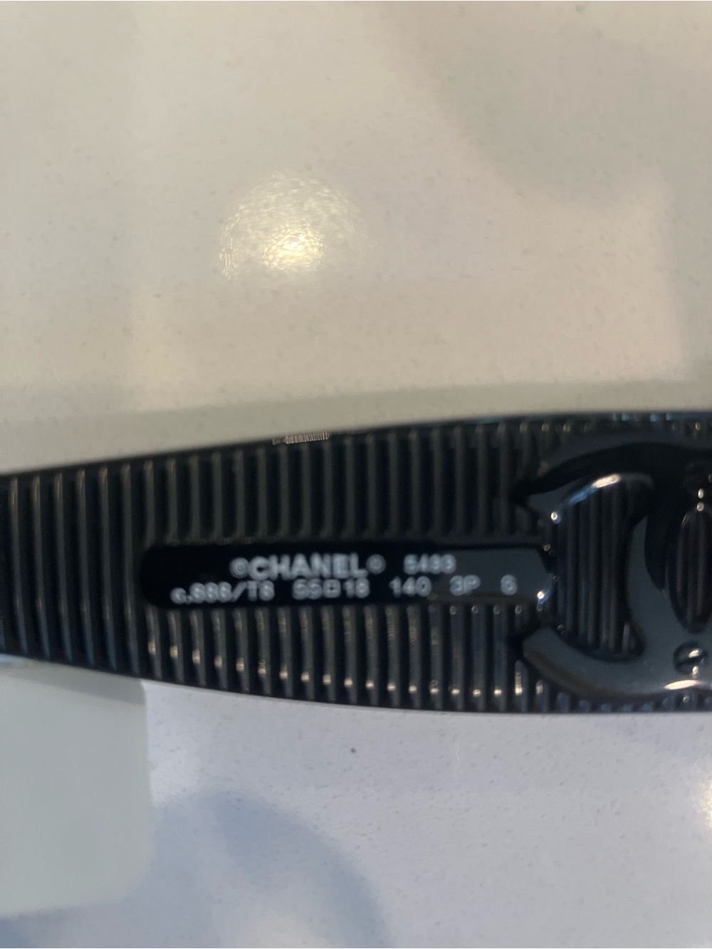 CHANEL Black Ribbed Logo Sunglasses Temple Detail